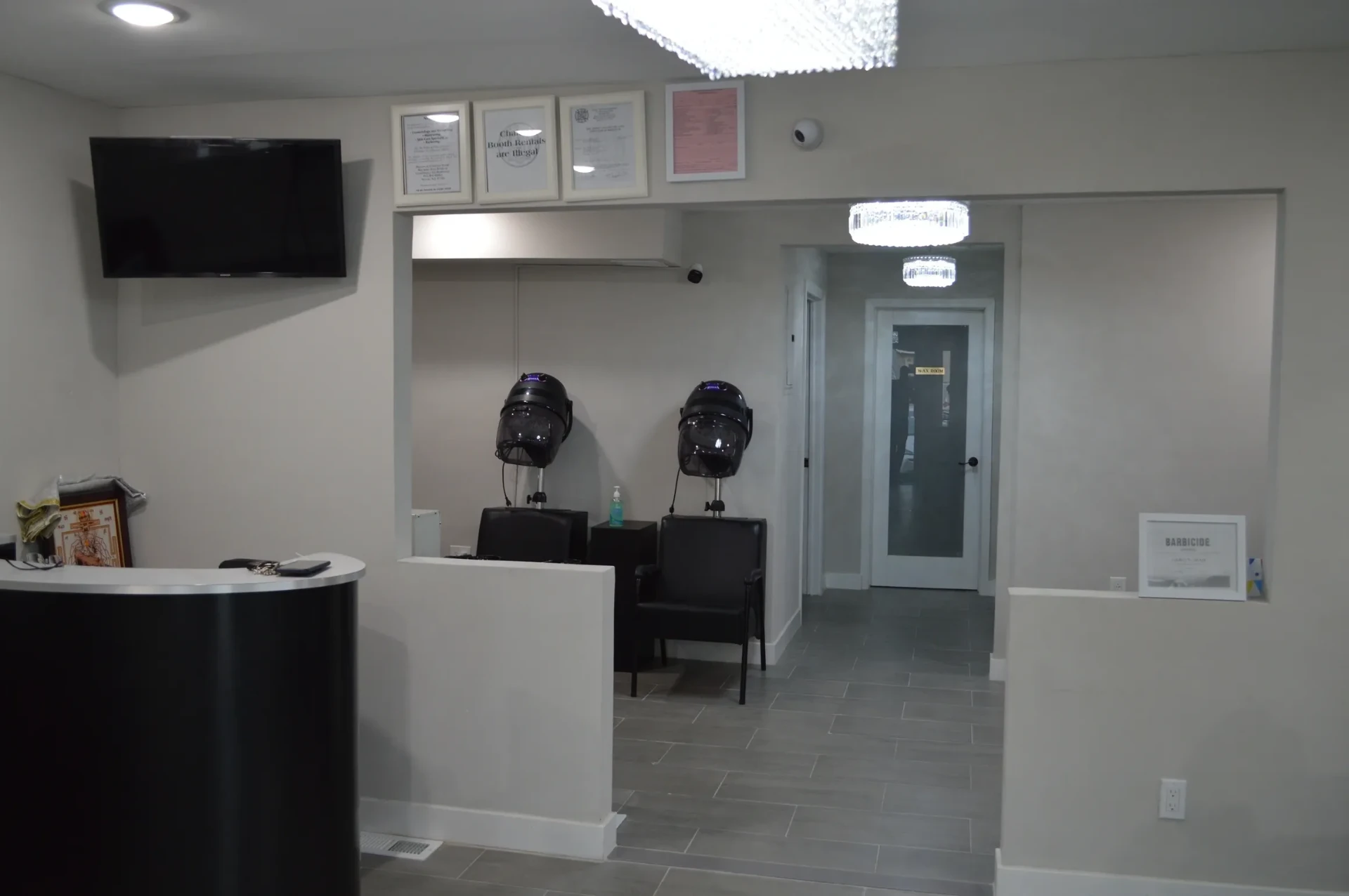 Reception counter at Gargi's Beauty Clinic with hallway to the treatment rooms
